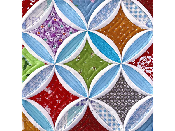 Charming Echo — Cathedral Window quilt by Felisa Nakazawa